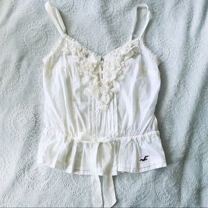 Hollister white ruffle button tank bow S